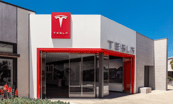 tesla sales center with tesla logo on building for tesla sales